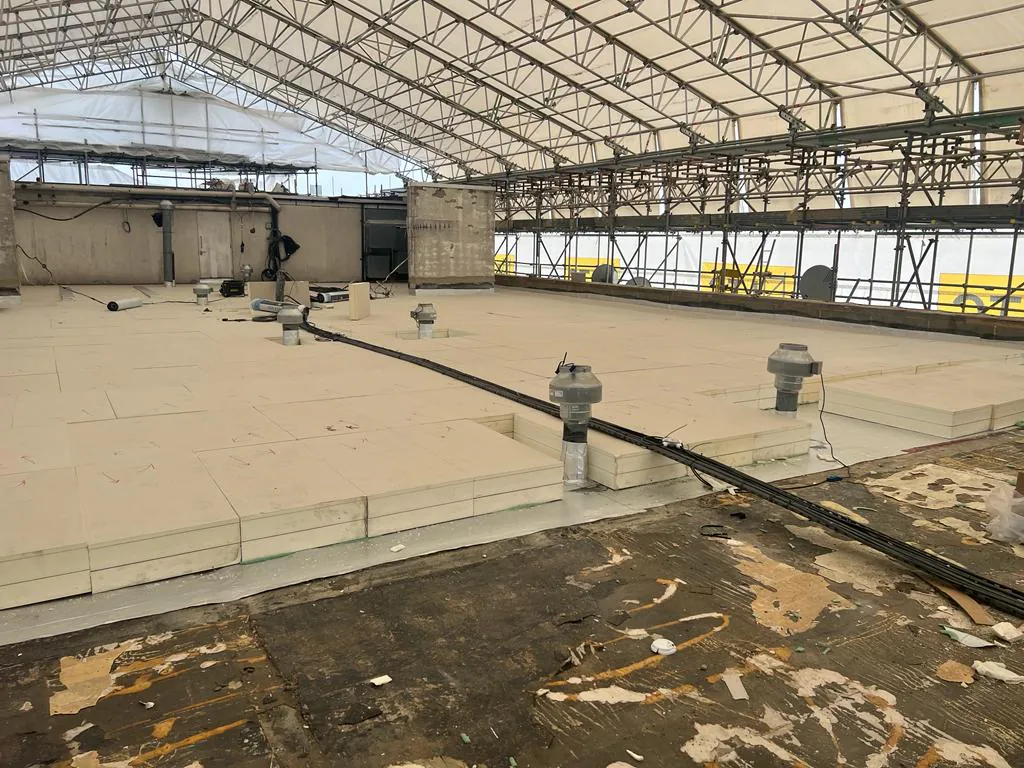 Roof membrane replacement and insulation